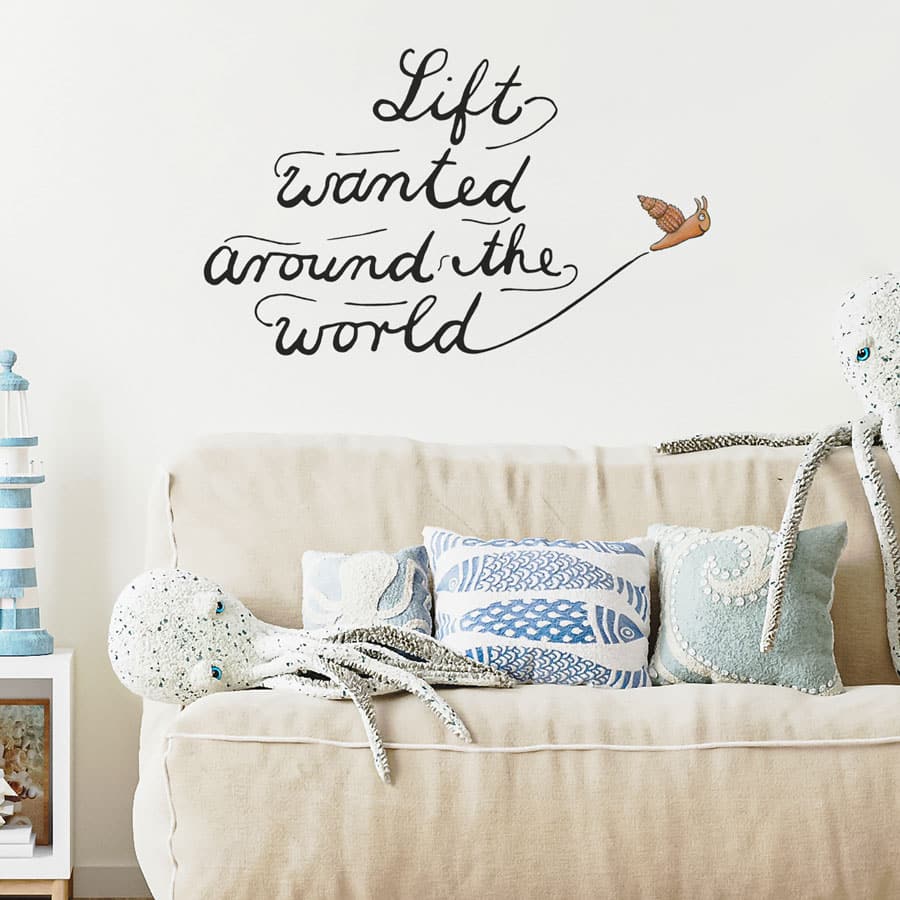 The Snail and the Whale lift wall sticker (Large size) above a sofa bed
