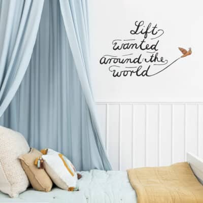 The Snail and the Whale lift wall sticker (Regular size) above a child's bed
