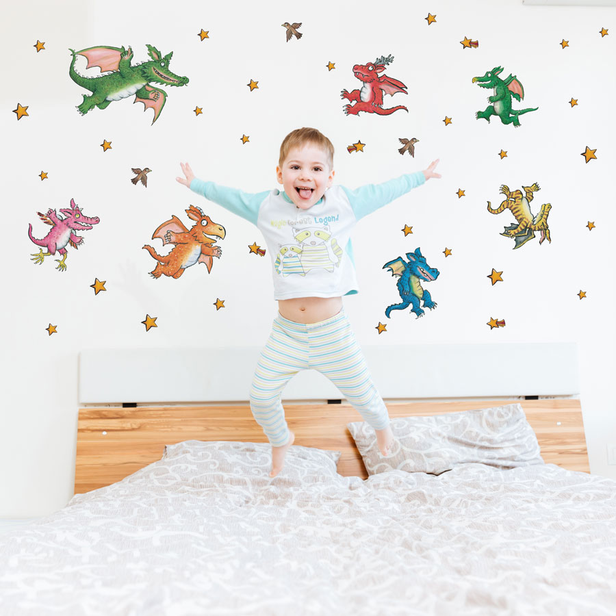 Zog and Dragons wall sticker pack (Regular size) above a child's bedroom with child jumping