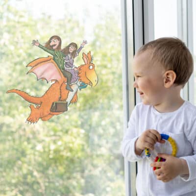 The Flying Doctors window sticker (Regular size) on a window with child