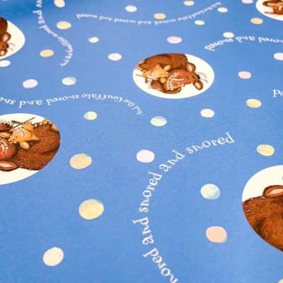 close-up of the gruffalo's child roller blind showing gruffalo themed pattern with blue background