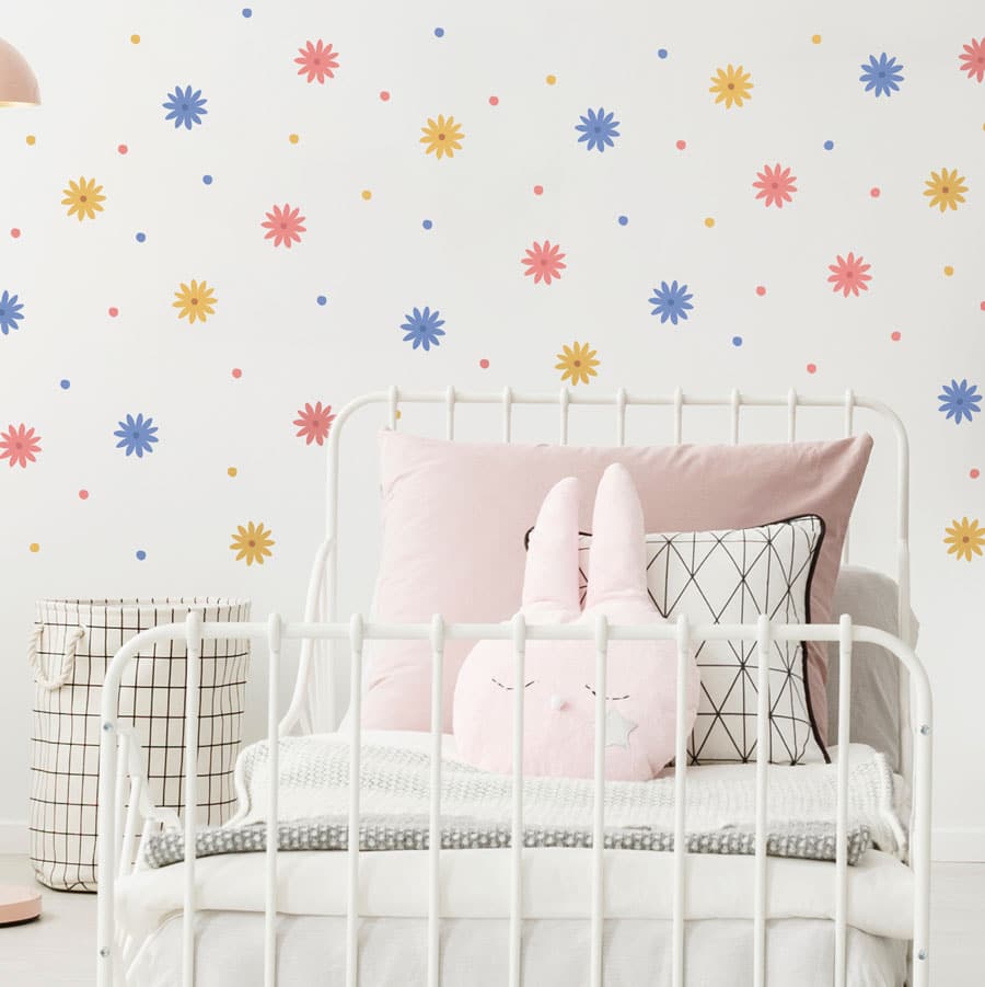 Small Flower Wall Stickers in bright colours on a white wall