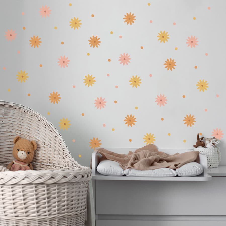 Small Flower Wall Stickers in orange on a white wall