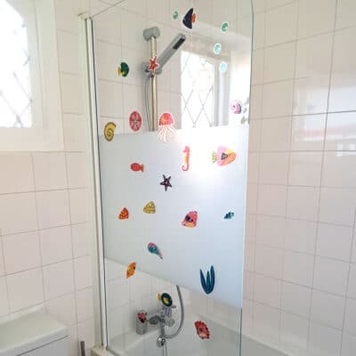 Seashells and Fish Window Stickers on a shower screen