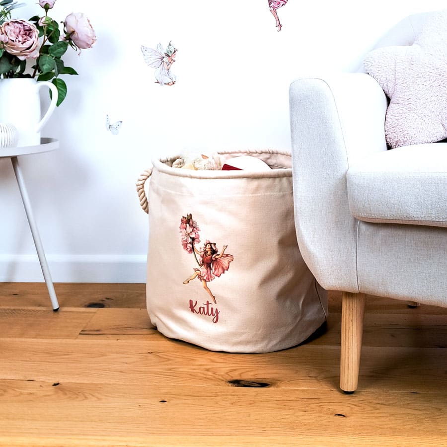 The Almond Blossom Storage Trug in room with chair and flowers