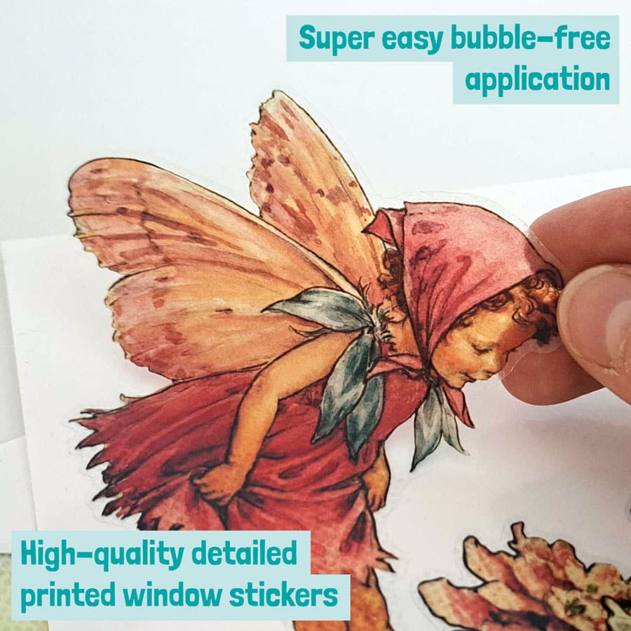 Pink Flower Fairies Window Stickers being removed from the backing sheet