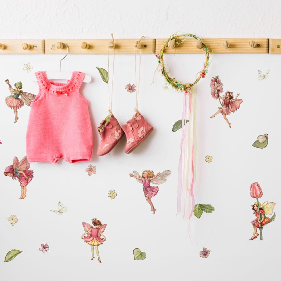Pink Flower Fairies Wall Stickers on a white wall with coat hook