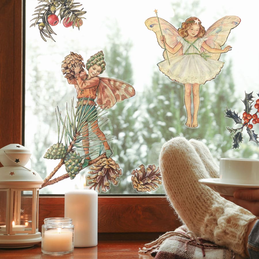 Winter Fairies window sticker on a window with winter scene