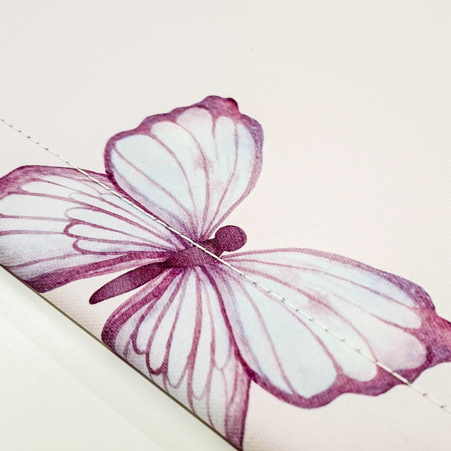 Pink Butterflies Roller Blind close-up with bottom bar and stitching