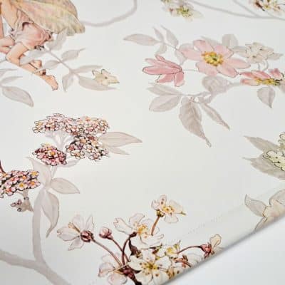 close-up of the jasmine flower fairy roller blind showing the bottom bar with stitching