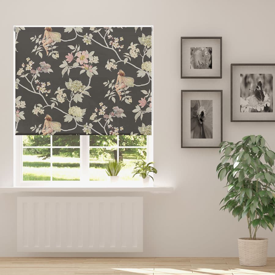 The Dark Jasmine Flower Fairy roller blind in a living room with a plant