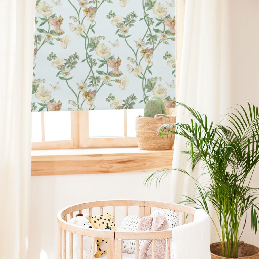 The Narcissus Flower Fairy in front of a cot