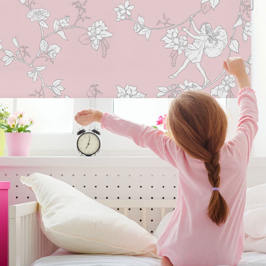 The Daydream Flower Fairy roller blind in a child's bedroom with child waking up