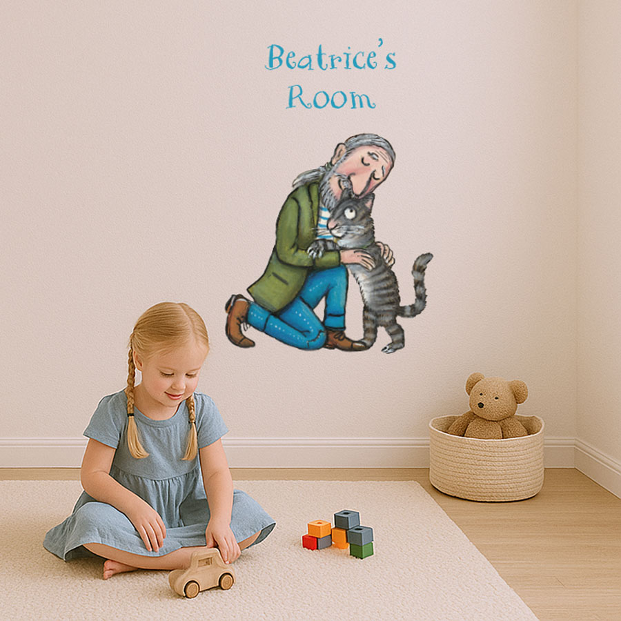 Personalised Tabby McTat Wall Sticker decorating a child's playroom with girl sitting on carpet