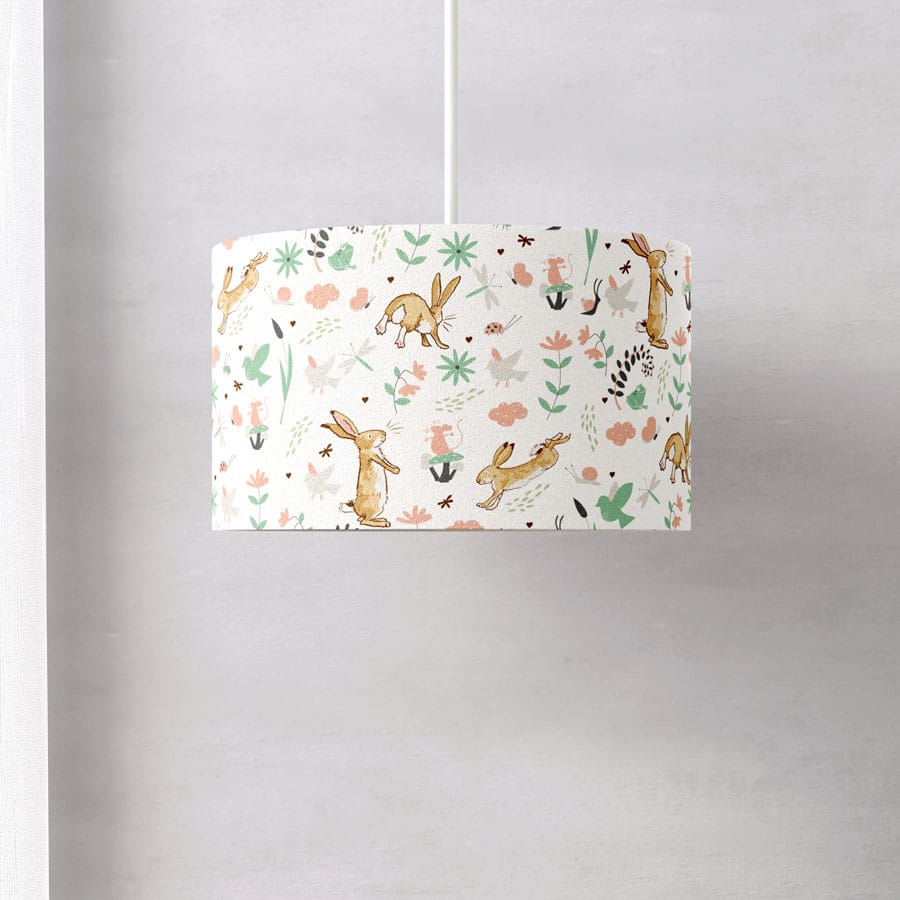 Guess How Much I Love you themed lampshade on a white background on ceiling pendant light fitting