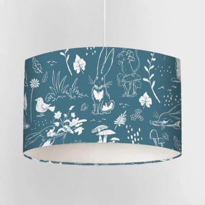 Blue Sketch Hares lampshade with white Guess How Much I Love You™ illustrations, showing woodland animals on a seamless soft blue background.