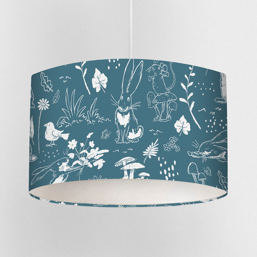 Blue Sketch Hares lampshade with white Guess How Much I Love You™ illustrations, showing woodland animals on a seamless soft blue background.
