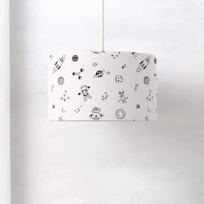 Monochrome Space Lampshade on a grey wall with a ceiling pendant