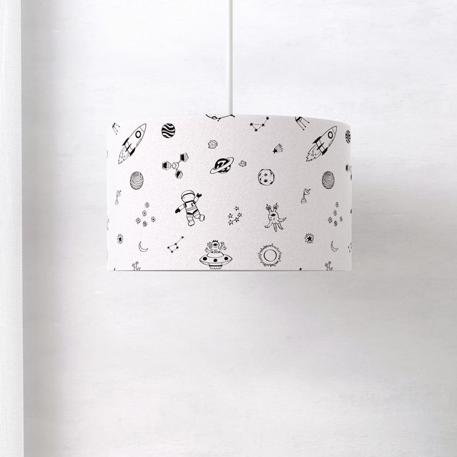 Monochrome Space Lampshade on a grey wall with a ceiling pendant