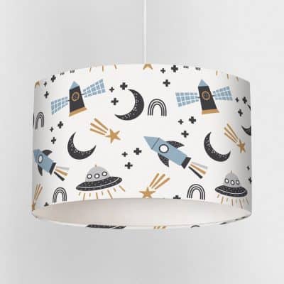 Close-up view of Scandi Space lampshade featuring rockets, stars, moons, and satellites in muted blue, black and mustard tones on a white background.