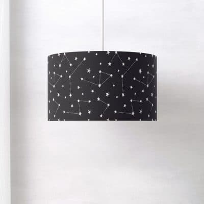 Side view of the Dark Constellations lampshade, highlighting the smooth printed finish and wraparound night-sky design.