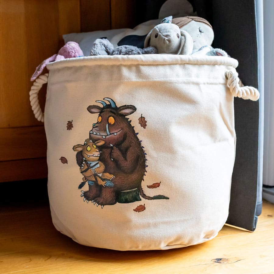 The Gruffalo’s Child soft storage basket filled with soft toys, styled in a child’s bedroom – ideal for nursery or toy storage.