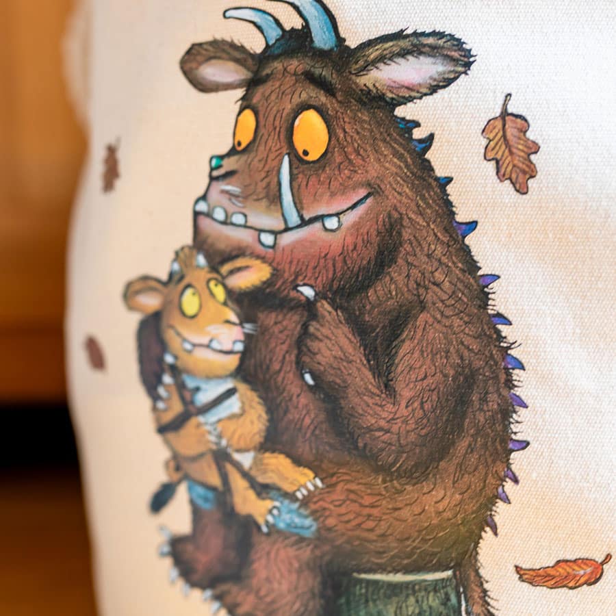 Close-up of The Gruffalo and his child illustration on a cotton canvas storage basket – part of Stickerscape’s official Gruffalo collection.