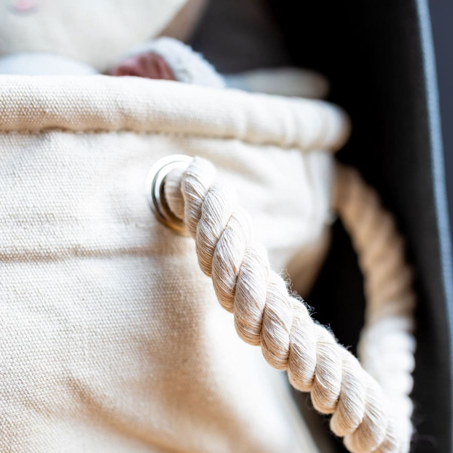 Detail of the thick rope handle on The Gruffalo’s Child soft storage basket – made from natural cotton canvas.