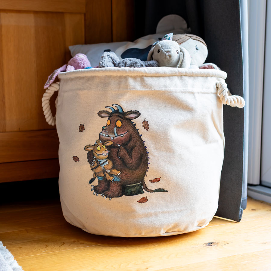 The Gruffalo’s Child canvas storage basket shown in a nursery space – perfect for storing toys, books or baby essentials.