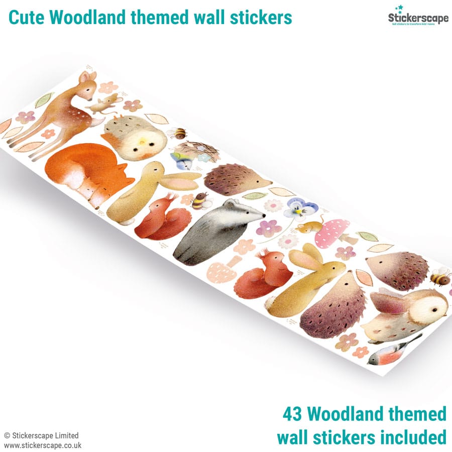 Woodland wall sticker sheet showing 43 peel-and-stick designs including animals, flowers, and leaves, illustrated by Ginger Betty.