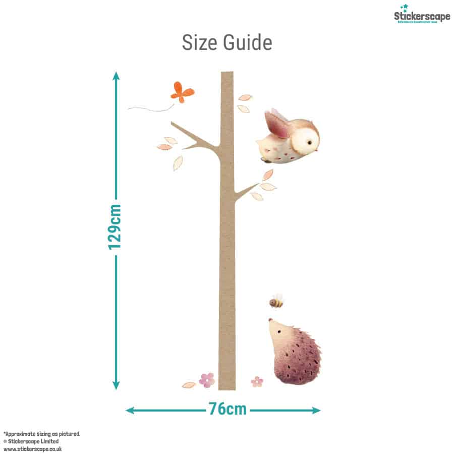 Size guide for woodland tree wall sticker showing total design height of 129cm and width of 76cm with owl, hedgehog and leaves.