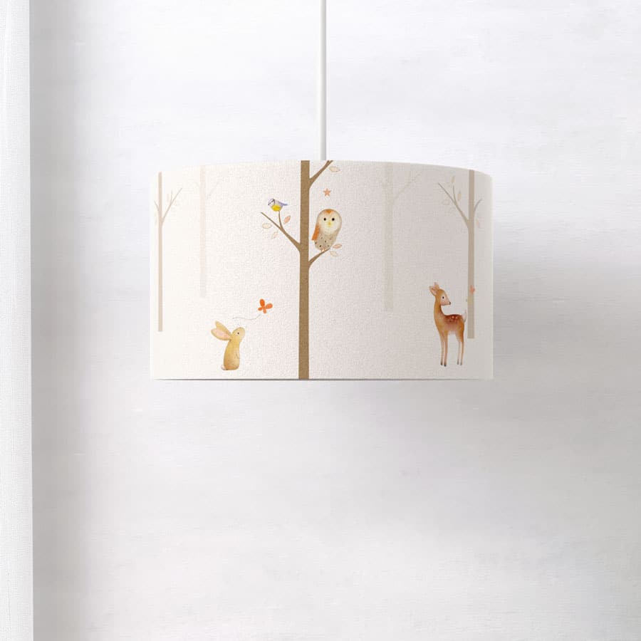 Side view of woodland lampshade with animal illustrations by Ginger Betty for nursery decor