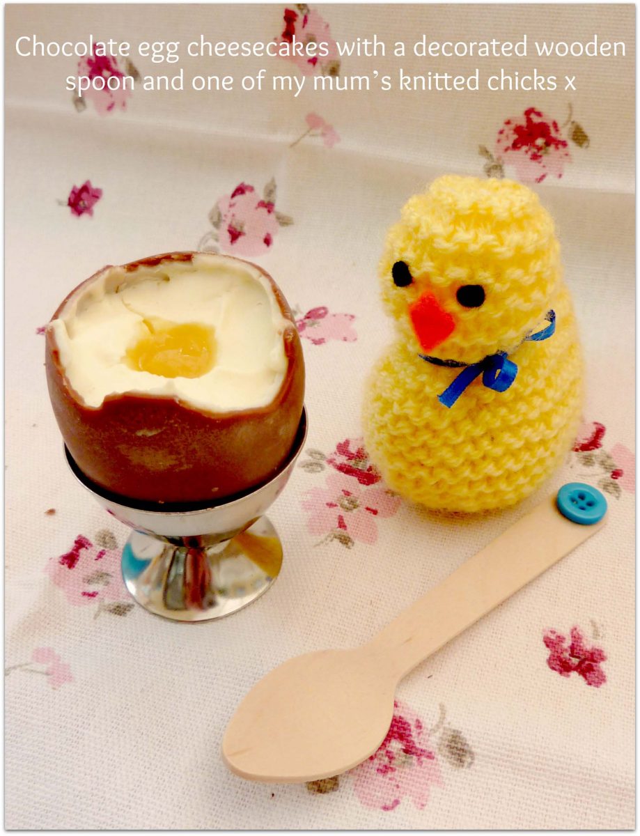 Chocolate egg cheesecakes with a spoon ready for eating at Easter