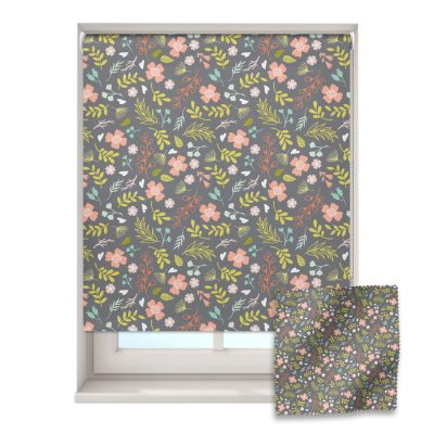 dark florals roller blind on a window with a fabric swatch in front