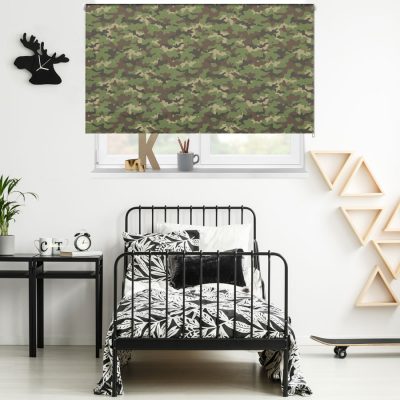 green camouflage roller blind in a boy's bedroom blackout