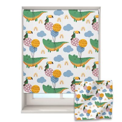 crocodile and balloons roller blind on a window with a fabric swatch in front